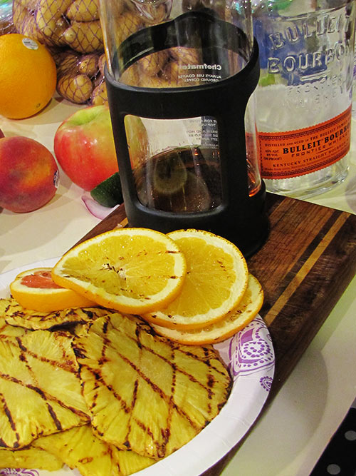 grilled citrus for whiskey cocktail in coffee press