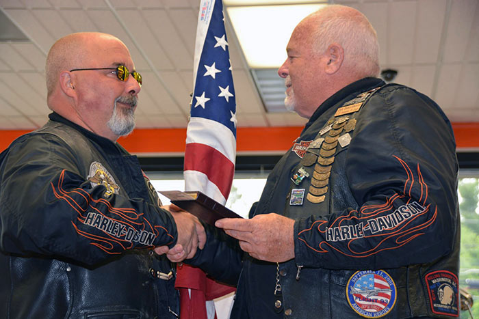 Official transfer of the flag as it heads off to McDermott's Harley-Davidson in Fort Ann, NY 