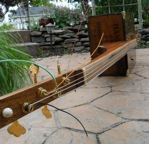 Bass with musket  ball in headstock